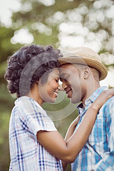 Peaceful couple standing nose to nose