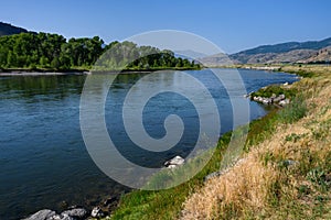 Peaceful day on the Gallatin River in Montana, nature landscape as a background photo