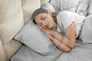 Peaceful european woman enjoying restful sleep