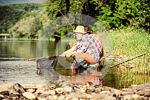 Peaceful fishing. Two male friends fishing together. happy fishermen friendship. fly fish hobby of men in checkered