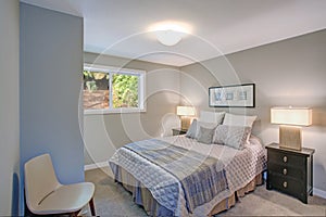 Peaceful gray blue bedroom interior photo