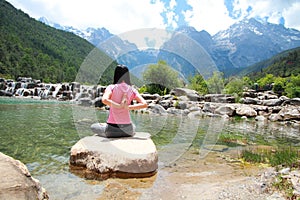 Peaceful happy life, careless Asian Chinese woman yoga