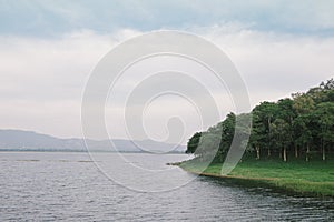 Peaceful lake in cloudy day