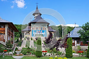 Orthodox church - Monastery Bujoreni, landmark attraction in Romania. Spring landscape