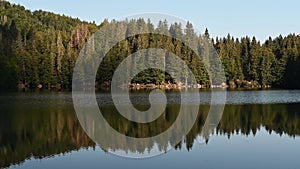 Peaceful place in nature on the mountain lake