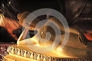 Peaceful reclining marble Buddha statue