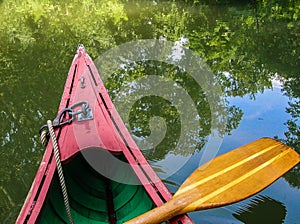 Peaceful Reflection of Nature While Canoeing