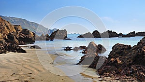 Peaceful sandy beach in Guernsey