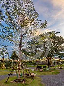 Peaceful scene in public garden under twilight colorful sky in evening