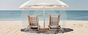 peaceful scene with two beach chairs and umbrellas overlooking the calm ocean