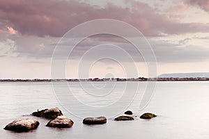 Peaceful seascape - water sky and rocks