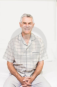 Peaceful senior man smiling