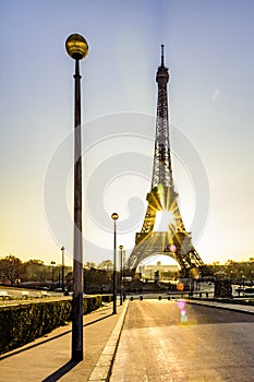 Peaceful sidewalk and sunrise over Paris