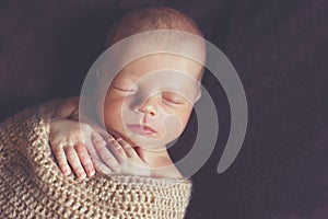 Peaceful sleep of a newborn baby