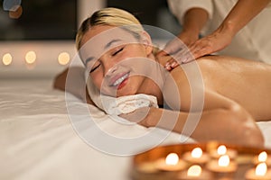 Peaceful Spa Day with a Back Massage for a Young Woman