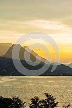 Peaceful sunset looking out over the lake from Maraschina toward the mountains