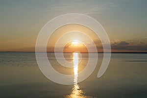 Peaceful sunset over baltic sea in summer evening