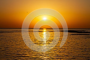 Peaceful sunset over calm Mediterranean sea