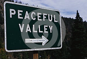 Peaceful Valley directional road sign