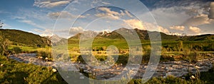 Peaceful view of mountain range in sunlight