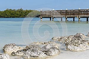 Peaceful View of a Wooden Dock and Mangroves Beyond on Sombrero Beach of Marathon Key