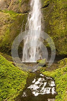 Peaceful waterfall and rocks