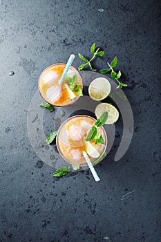 Peach Aqua Fresca with Lime Juice and Mint Leaves
