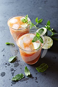 Peach Aqua Fresca with Lime Juice and Mint Leaves photo