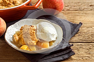 Peach cobbler with ice cream photo