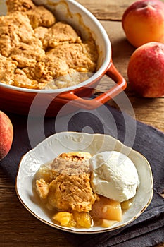 Peach cobbler with ice cream photo