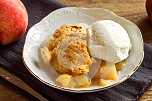 Peach cobbler with ice cream photo