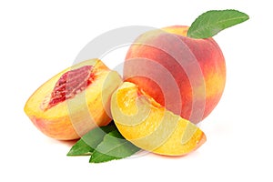 peach fruit with green leaf and slices isolated on white background