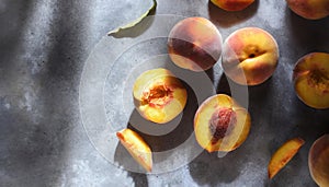 Peach fruits still life on dark grunge background