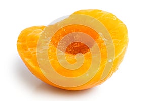 Peach half isolated on white background.