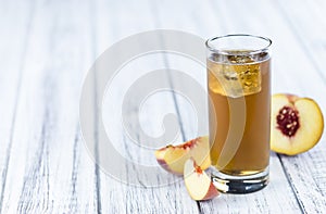 Peach ice tea (selective focus)