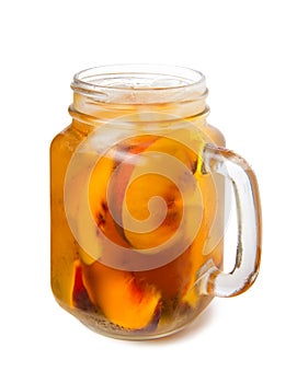 peach iced tea in a glass jar Isolated on a white background