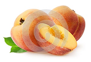 Peach isolated. Two whole peach fruits with half and leaves isolated on white with clipping path