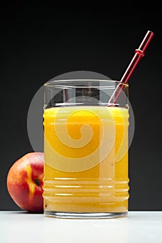 Peach juice in glass