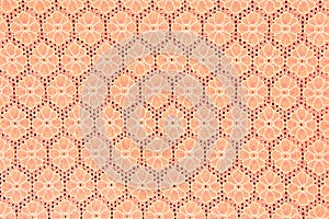 Peach lace sits on background