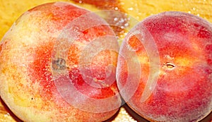 peach and paraguayan on a cutting board in the kitchen photo