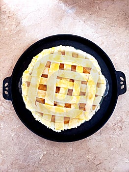 Peach pie homemade with lattice top dough