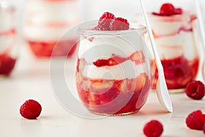 Peach and raspberry dessert with yogurt cream