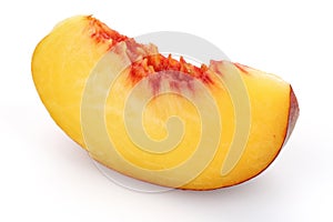 Peach slice on white background