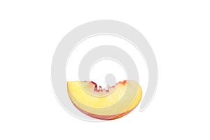 A peach slice on a white background, isolate