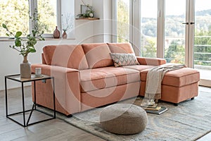 Peach sofa in light living room photo