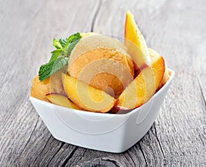 Peach sorbet with mint photo