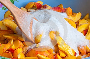 Peach with sugar close up fruit background