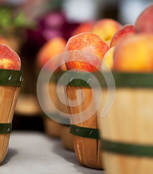 Peaches in baskets at Farmer's Market