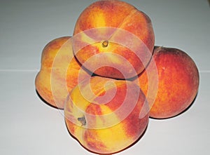 Peaches nectarines on a white background, macro