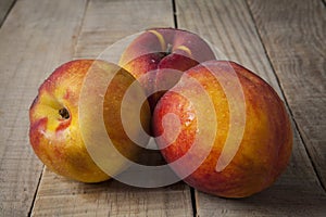 Peaches on a old wooden table